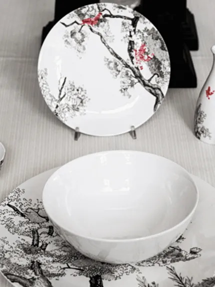 White porcelain plate with a delicate floral pattern