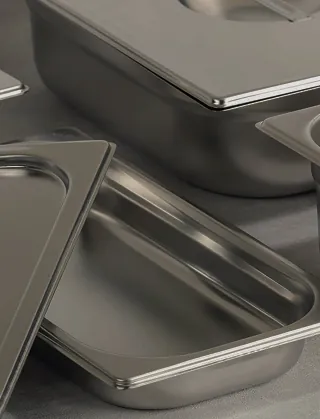 Stainless steel gastronorm pans in a buffet counter